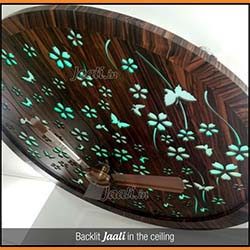 Backlit combination material (veener + MDF) Jaali in the ceiling of a living area  copy.jpg
